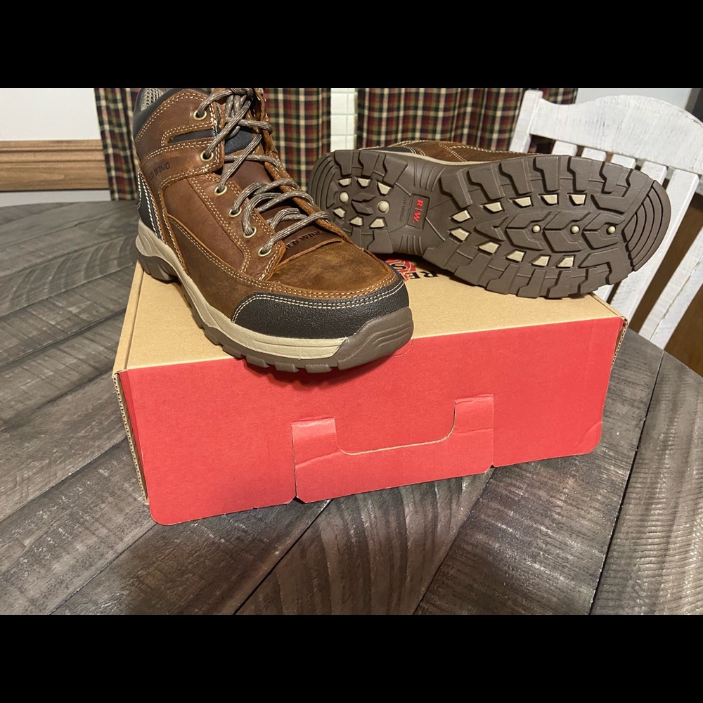 Mens size 8 1/2 brand new  aluminum toe redwing boots.